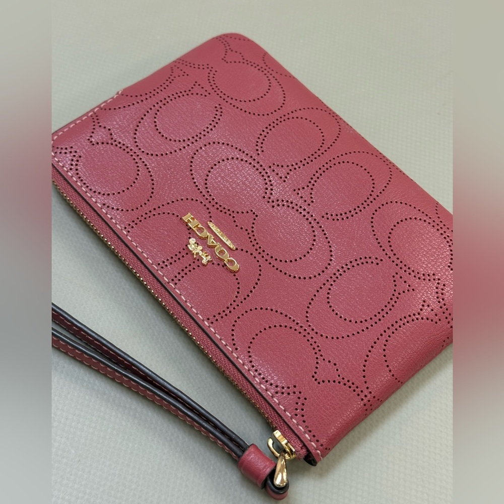 Coach Perforated Pink Wristlet Clutch